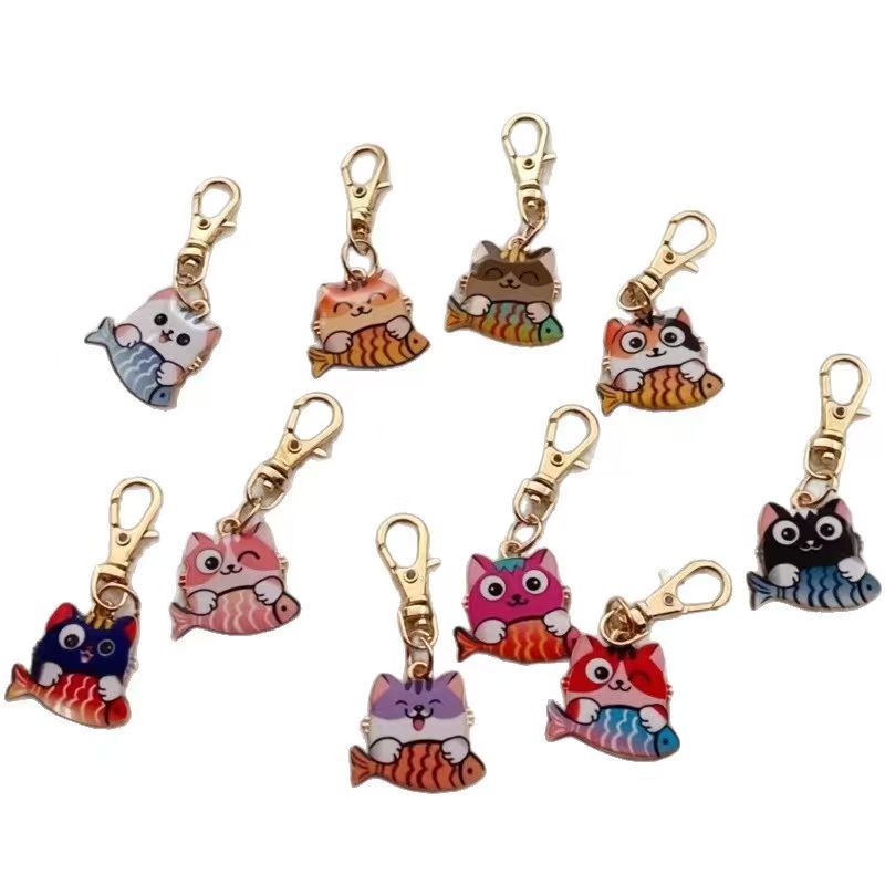 10 buah gantungan kunci kucing - Wallets ulasan dan harga